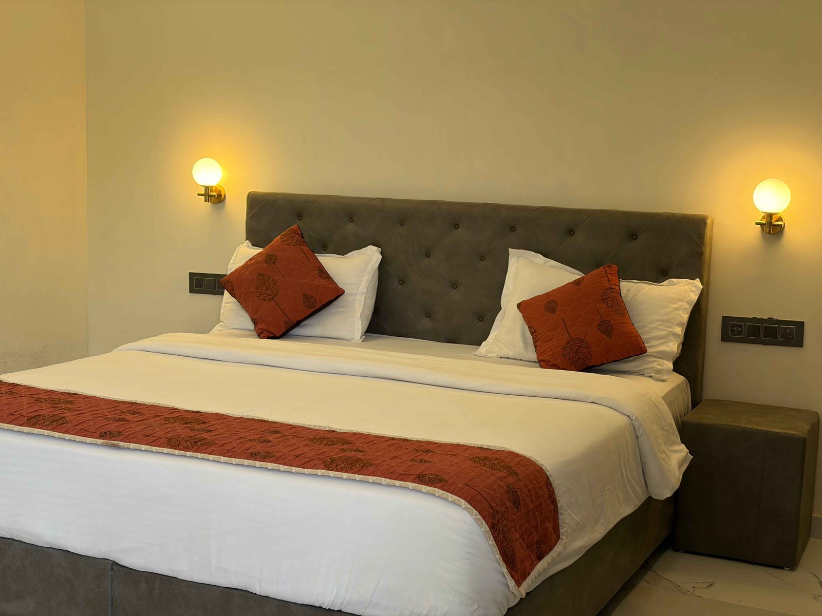 Expansive living area with floor-to-ceiling windows overlooking forest