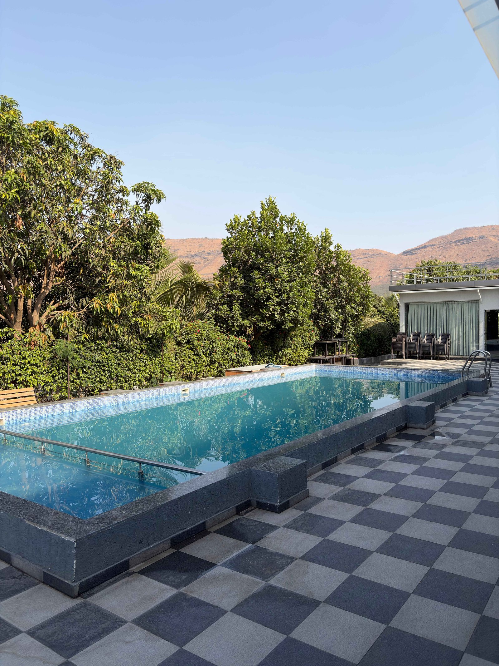 Aerial view of Nature's Bliss Villa nestled among lush forest canopy
